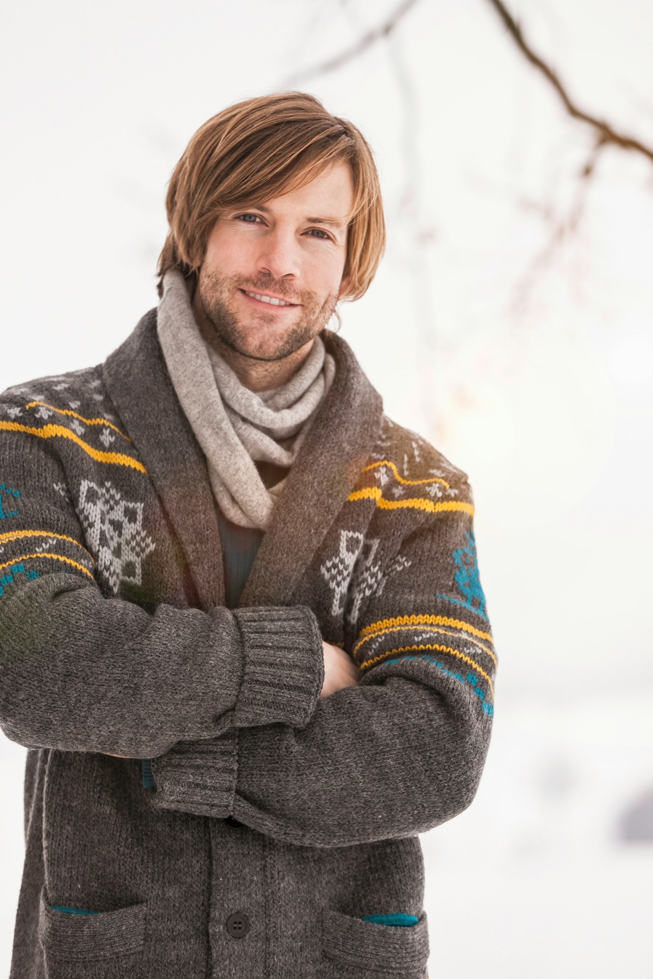 Portrait of man wearing knitted cardigan